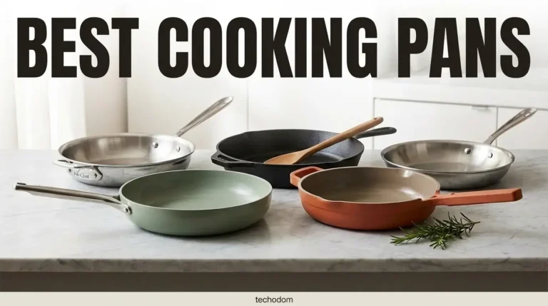 Five best cooking pans for 2026 arranged on marble countertop including stainless steel, ceramic nonstick, and cast iron skillets